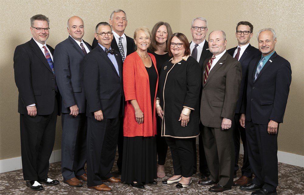 01. Board of Directors  2018-2019: Front row (left to right): Co-Founder and Executive Director Rick Barlow, Ed Hisscock, Mark Van Sumeren, Karen Conway, Treasurer Deborah Templeton, R.Ph., Co-Founder and Founding Chairman Jamie Kowalski (Bellwether Class of 2017), Chairman Nick Gaich (Bellwether Class of 2013).  Back row (left to right): Todd Ebert, R.Ph., Dee Donatelli, Chairman Emeritus John Gaida (Bellwether Class of 2018) and Secretary Nate Mickish (Future Famers Class of 2015).