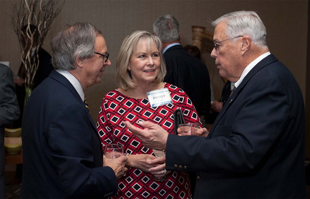 Derwood Dunbar (Bellwether Class of 2011) chats with Founding Sponsor MedAssets’ Peggy O’Brien (center) and Ray Seigfried (Bellwether Class of 2012) (left).