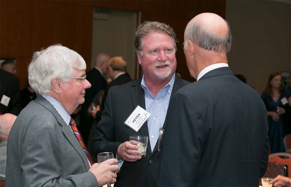 Champion Healthcare’s Peter Casady (center) with Bellwether League Board Member John Strong (Bellwether Class of 2011) (left) and Dick Perrin (Bellwether Class of 2014) (right, back to camera).