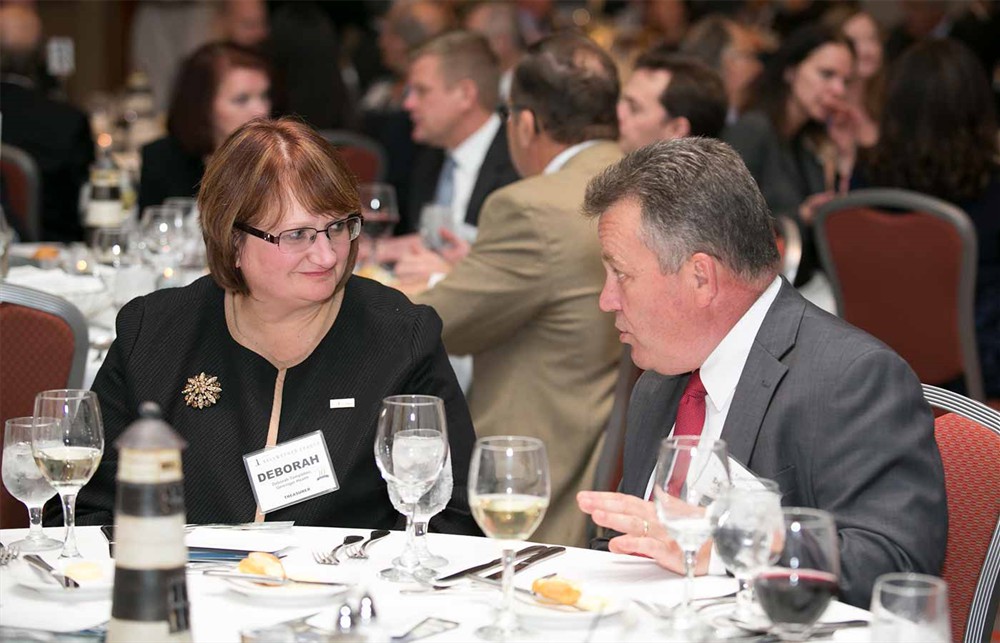Bellwether League Treasurer Deborah Templeton, R.Ph., (left) with SMI’s Dennis Orthman.