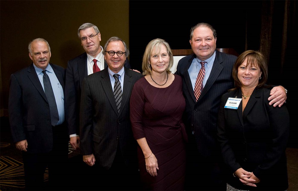 Ray Seigfried (Bellwether Class of 2012) is joined by his colleagues and supporters from Christiana Care and MedAssets, along with Bellwether League’s Pat Carroll (far left)