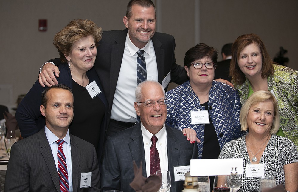 A Premier squad: George Hersch (center) (Bellwether Class of 2019) is flanked (clockwise from left) by Premier’s Mark Slone and Pam Daigle, Norton Healthcare’s Todd Lammert, Premier’s Karen Niven, Norton Healthcare’s Kathleen Exline and George’s wife Janie Hersch.