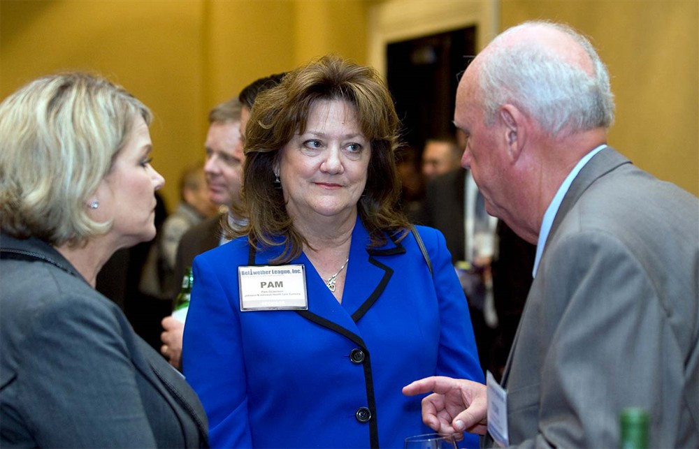 Tom Hughes shares some insights with Johnson & Johnson Health Care Systems’ Meg Walter (left) and Pam Dickerson (center).