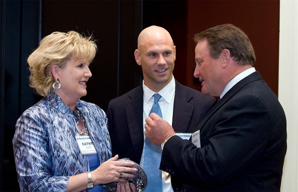 Gold Sponsor Cardinal Health’s Gregg Brewster (right), shares some thoughts with CareFusion Corp.’s Cathy Specht (left) as Founding/Platinum Sponsor Owens & Minor’s Gil Minor IV looks on (center).