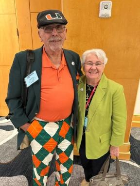 BLF BOD Outreach Ambassador Fred Crans, Bellwether Class of 2020, sporting the colors of his beloved alma mater, with BLF BOD Chairman Barbara Strain, Bellwether Class of 2021, at the Fall IDN Summit.