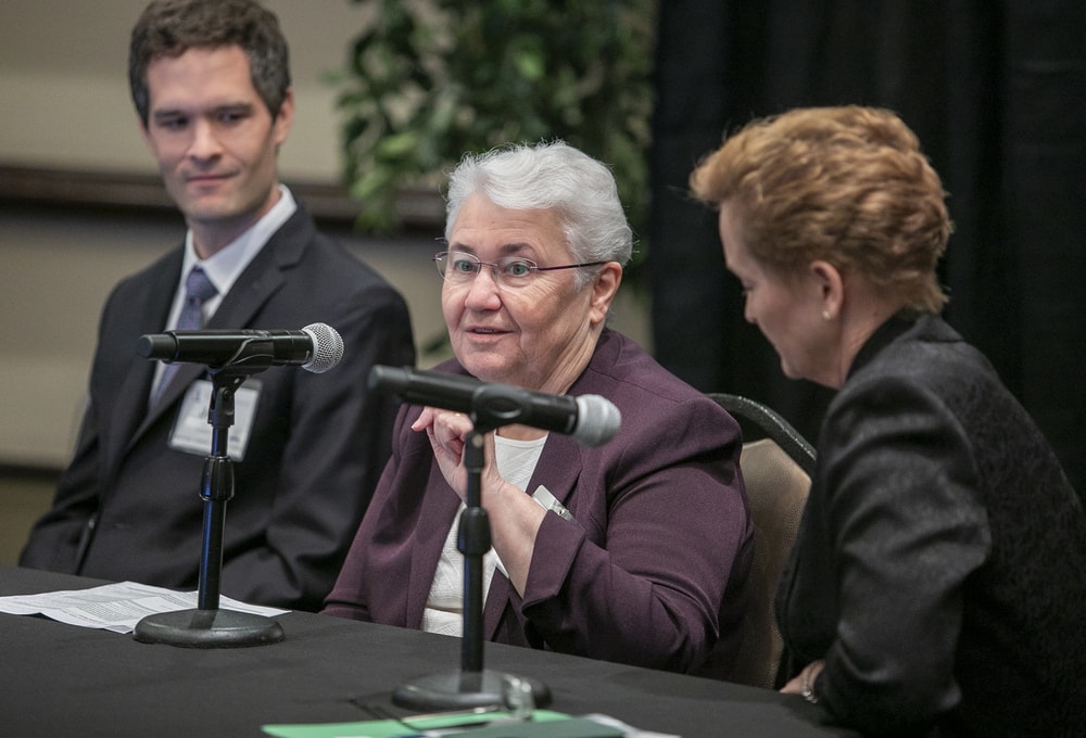 Barbara Strain (center), Bellwether Class of 2021, stresses a point as Jack Koczela (left), Future Famers Class of 2020, and Donna Van Vlerah (right), Future Famers Class of 2015 and Ammer Honoree 2021, look on.