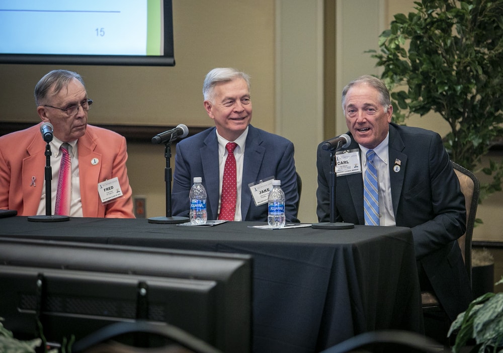 Carl Meyer (right), Bellwether Class of 2019, sparks discussion as Jake Groenewold (center), Bellwether Class of 2021, and Fred Crans (left), Bellwether Class of 2020, listen.