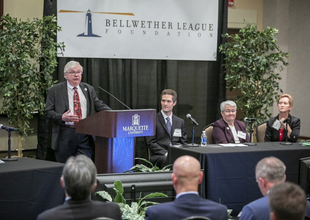 Moderator John Strong engages the attendees.