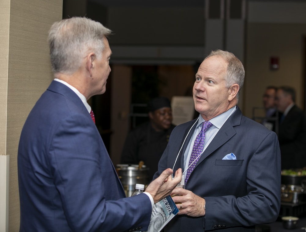 Dave Edwards (right), Founding Sustaining Sponsor Premier, chats with Jake Groenewold (left) (Bellwether Class of 2021).