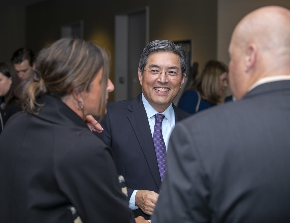 HIDA's Matt Rowan enjoys a lighter moment with Karen Kresnik, RN (Future Famers Class of 2017) and Founding Sustaining Sponsor Premier's David Hargraves (back to camera).