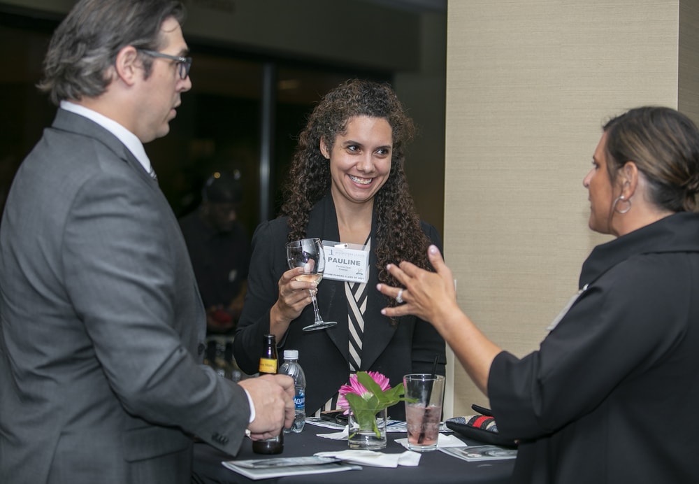 Future faming: Pauline Oyer, CMRP (Future Famers Class of 2021) (center) chats with Karen Kresnik, RN (Future Famers Class of 2017) (right) as Oyer's spouse John Oyer II looks on (left).