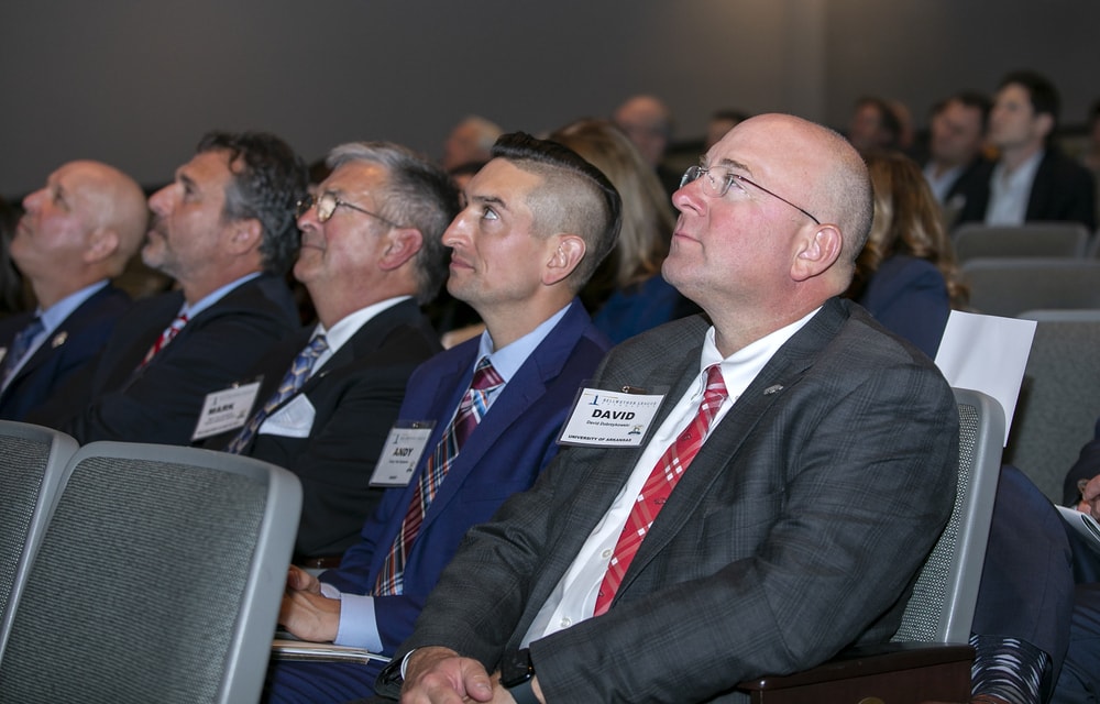 Members of Founding Sustaining Sponsor Owens & Minor's delegation appreciate the acceptance speeches.