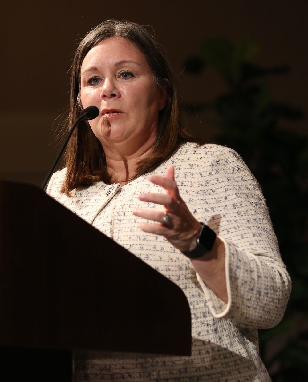 Lang at the podium