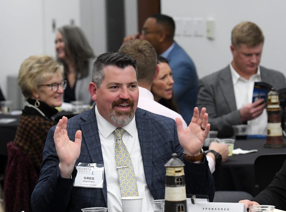 Greg Langlois, son of Mike Langlois, Bellwether Class of 2025, anticipates the start of the evening.