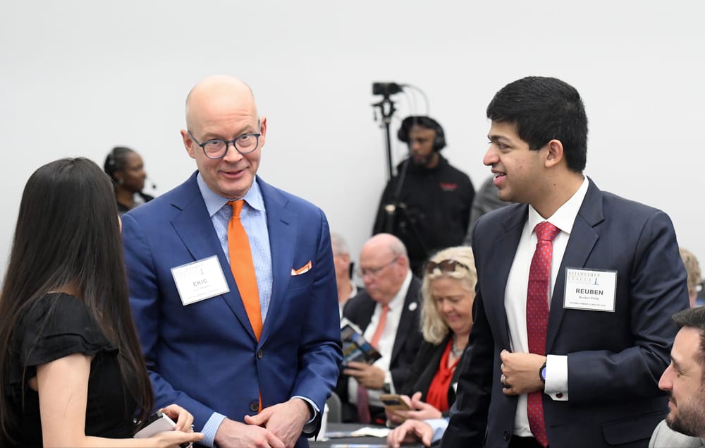 Eric O’Daffer, the William J. McFaul Memorial Keynote speaker, chats with Reuben Philip, Future Famers Class of 2025, and Philip’s spouse Meghana Prabhu Bantwal.