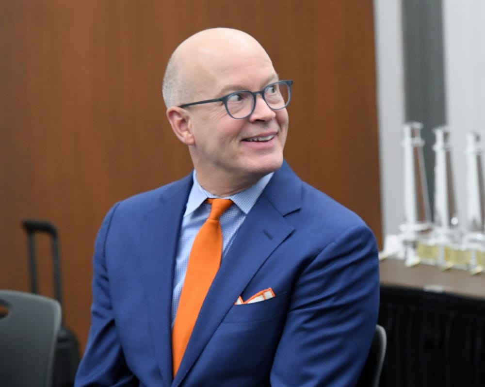 Eric O’Daffer, the William J. McFaul Memorial Keynote speaker, acknowledges a personal reference from the podium.