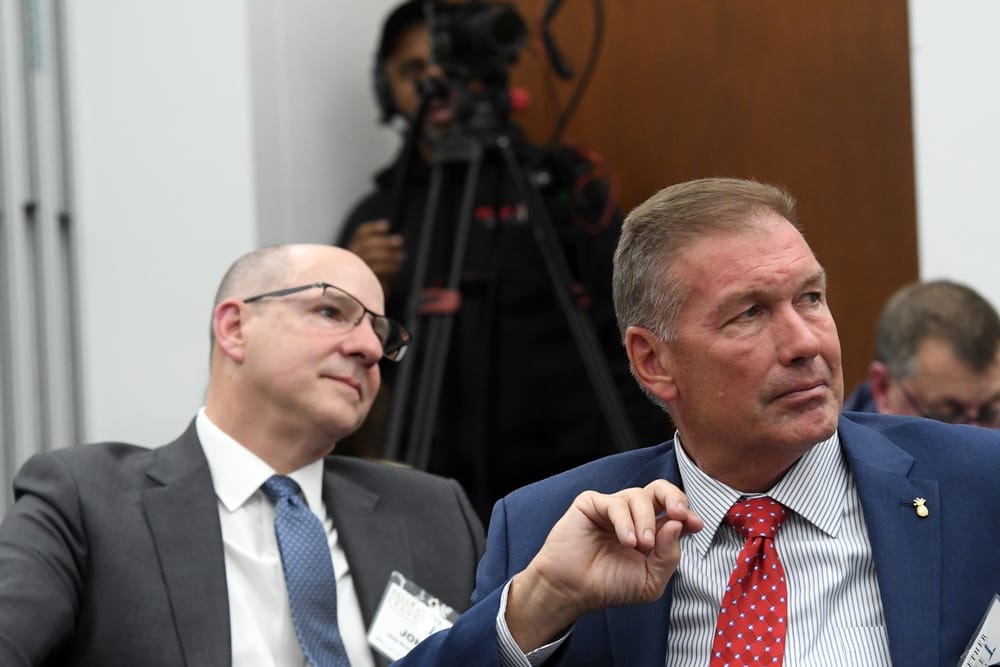 Vizient’s John Grande, Founding Sustaining and Scholarship Sponsor, and George Godfrey, Bellwether Class of 2025, listens.