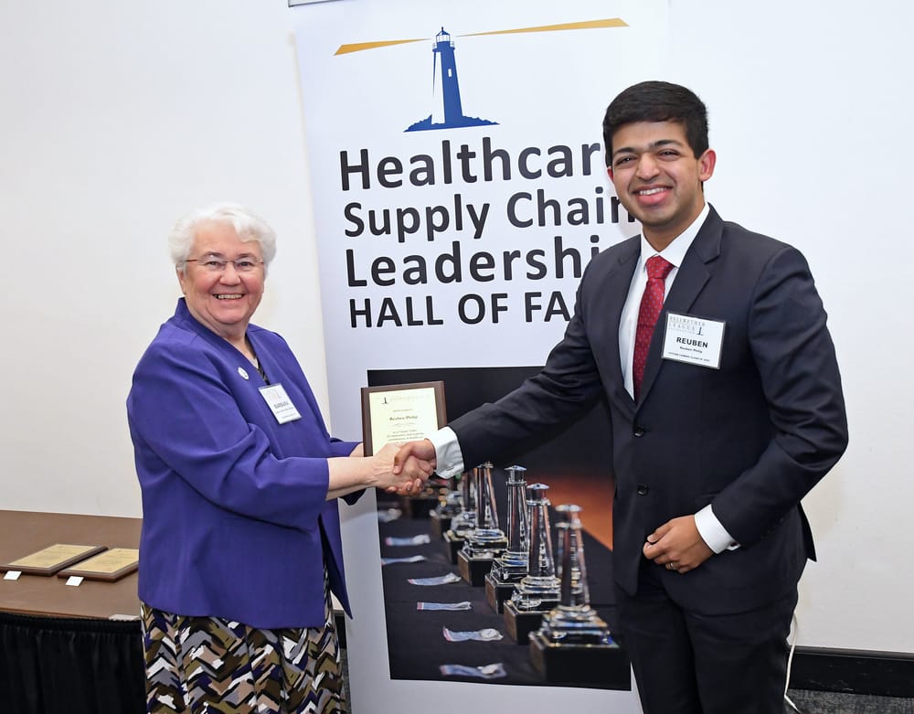 BLF Chairman Barbara Strain welcomes Reuben Philip, Future Famers Class of 2025.