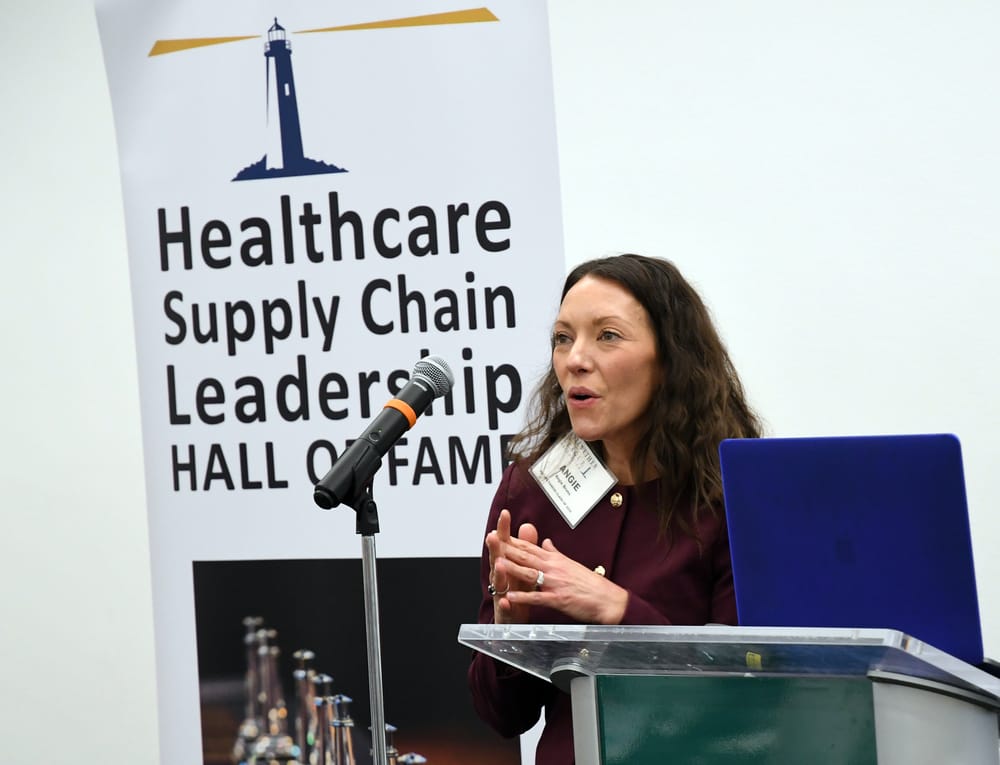 Angie Bruns, Future Famers Class of 2024, introduces Nicole Schmidt, RT (R)(VI), Future Famers Class of 2025.