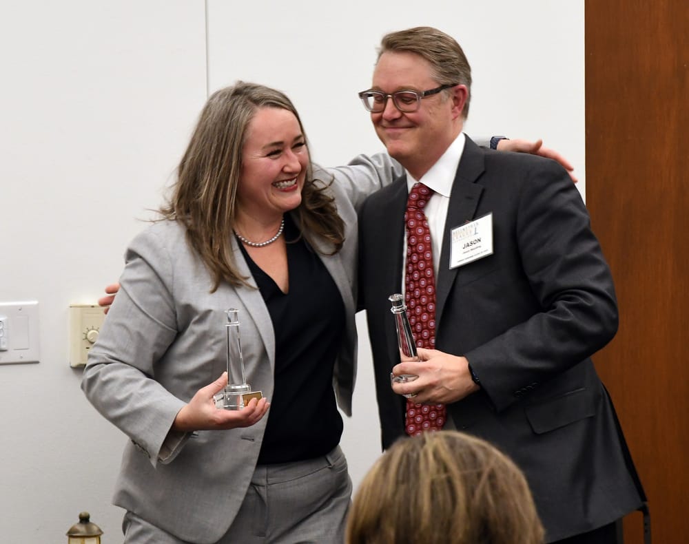 Fellow Ammer Honoree classmates Allison Corry and Jason Moulding share a light-hearted moment on stage.