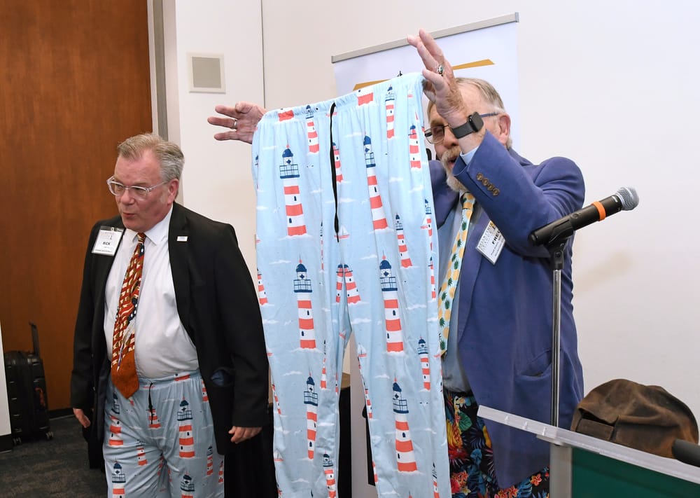 Fred Crans, Bellwether Class of 2020, bestows upon Barlow the honor of being the second recipient of the “prestigious Fred Crans Pants Award (FCPA),” which grants the awardee access to an exclusive cadre of creative and deep thinkers who wear eye-catching trousers that turn heads and inspire discussions. The first recipient was Randy Bradley, Ph.D., Ammer Honoree Class of 2020, back in August. Barlow promptly donned the lighthouse-themed trousers at the podium.