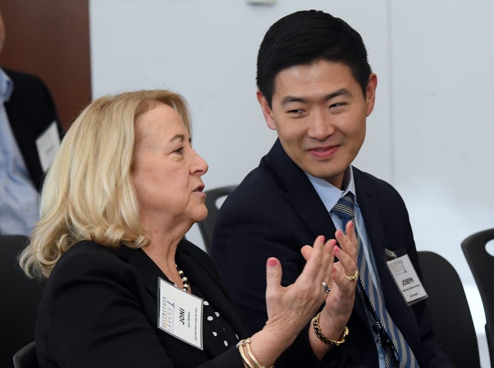Joni Rittler, Bellwether Class of 2025, converses with Joseph Jang, Pathstone Partners, during the Bellwether Leadership Symposium.
