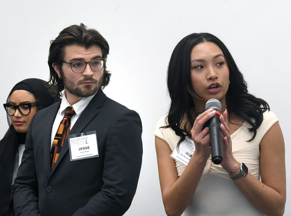 Wayne State University supply chain student Mia Bustamante delivers part of the team's Collegiate Capstone Project presentation during the Bellwether Leadership Symposium.