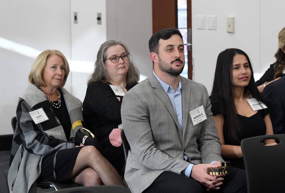 Carol Hisscock, Ann Colonna, Marcelo Fracchia and Meghana Prabhu Bantwal, spouse of Reuben Philip, Future Famers Class of 2025, listen to the WSU supply chain students.