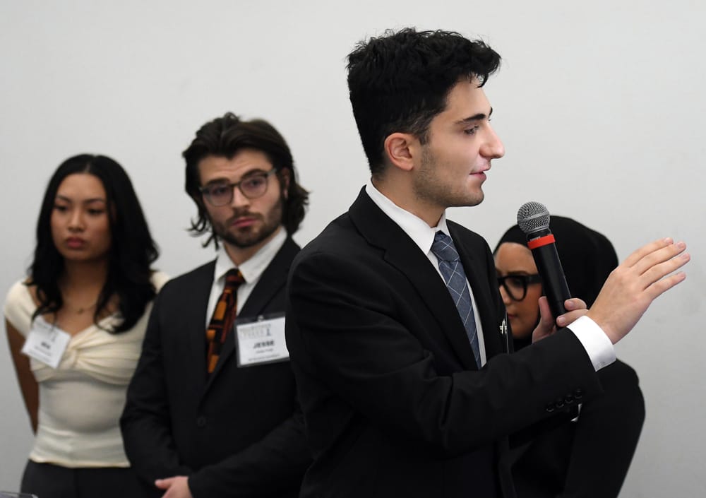 WSU supply chain student Daniel Saleem emphasizes a point during the Collegiate Capstone Project presentation.