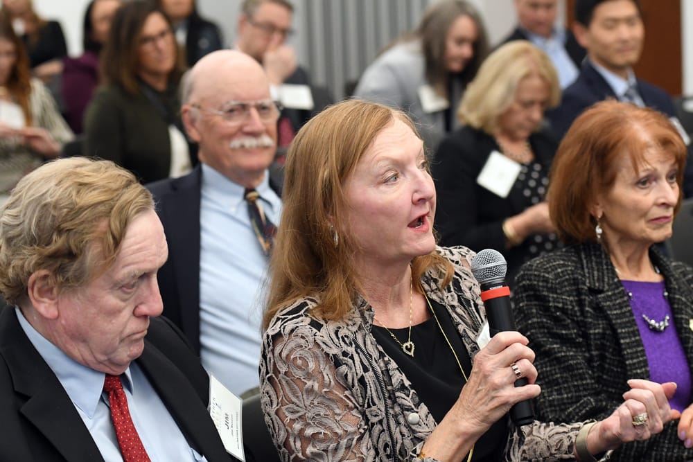 Kristine Russell, Bellwether Class of 2017, poses a question to the WSU students during their Collegiate Capstone Project presentation.