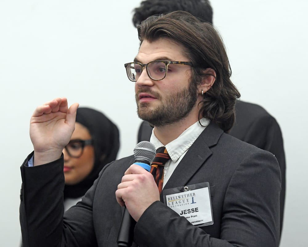 WSU supply chain student Jesse Pratt explains his point.