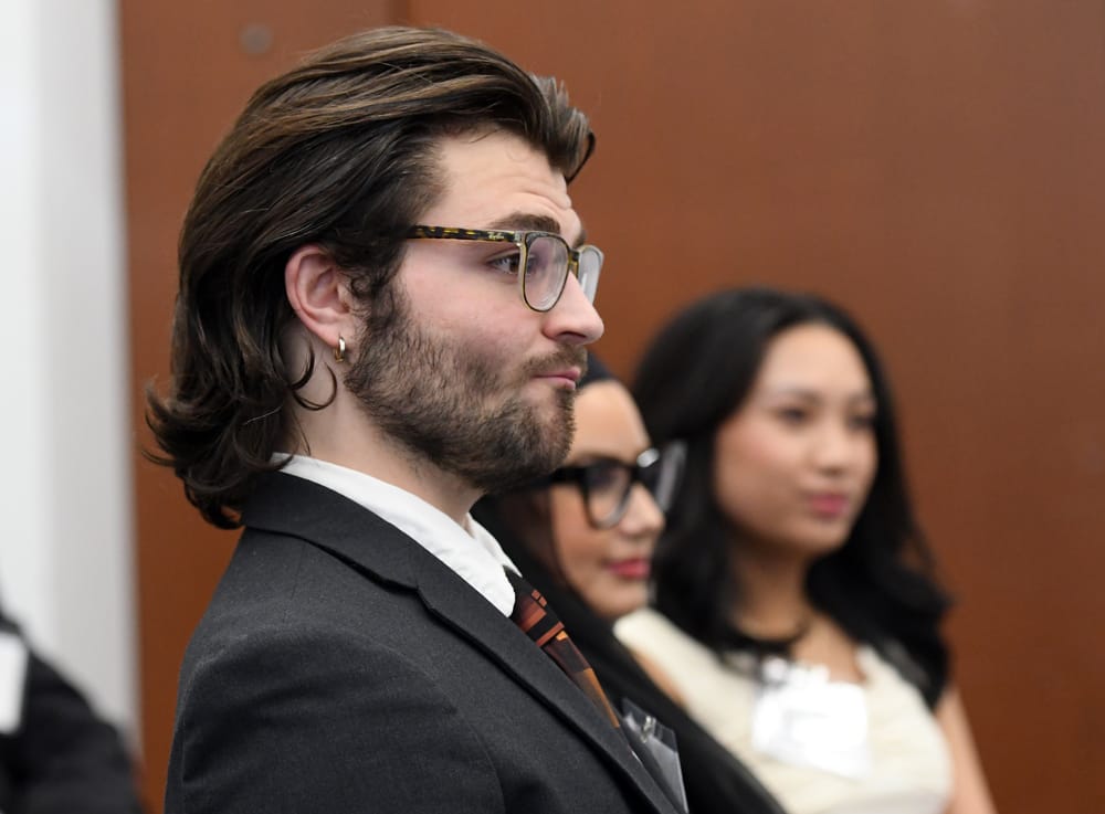 WSU supply chain student Jesse Pratt with Zeinab Alhilal and Mia Bustamante listen to the Bellwether Leadership Roundtable panelists.