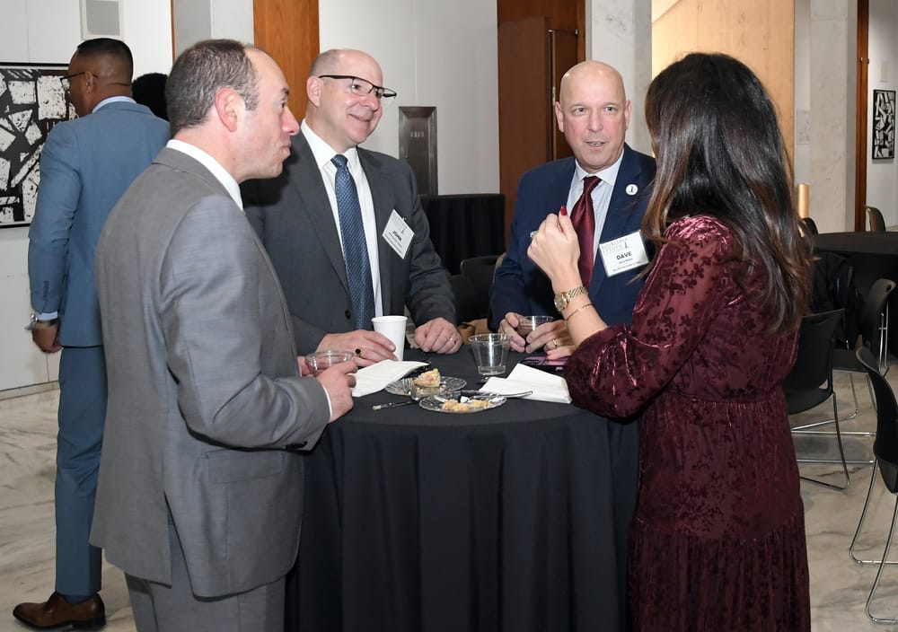 Enjoying food and conversation.