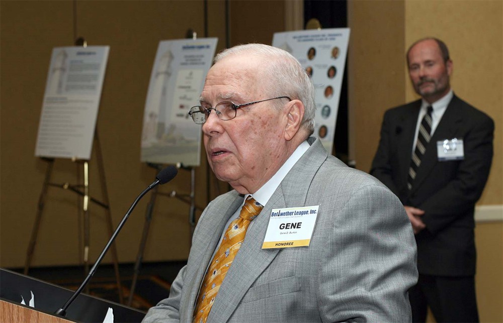 Gene D. Burton thanks those who worked with him and for him during his career as Bellwether League Inc. Chairman Jamie C. Kowalski looks on