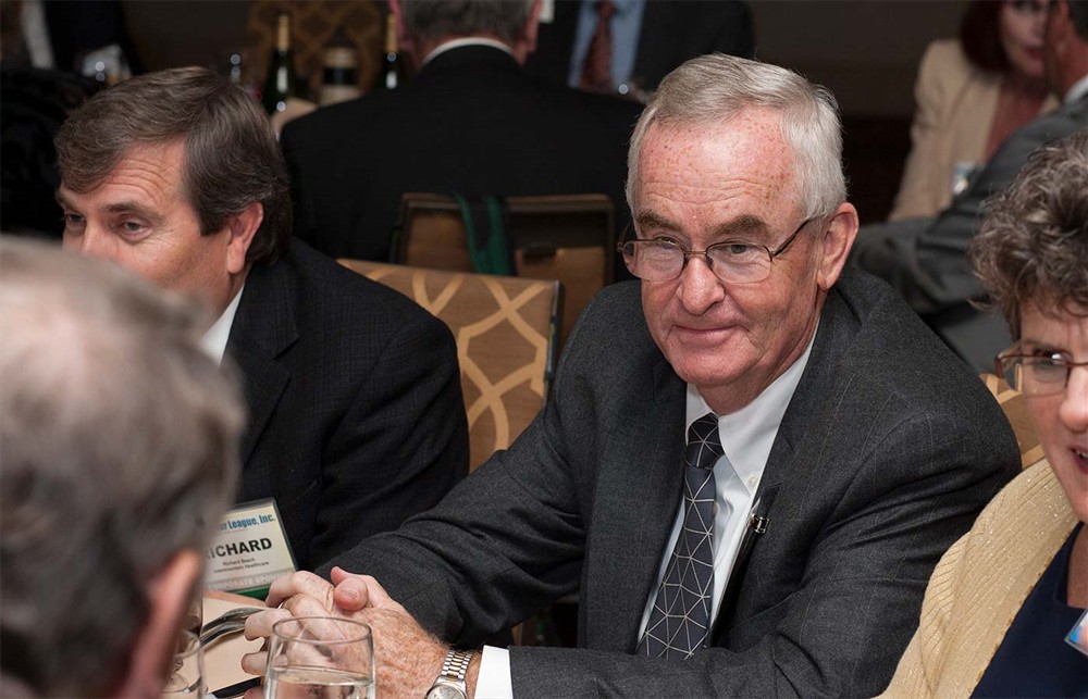 Bellwether Class of 2014 Honoree Brent Johnson listens intently to the conversations at his table.