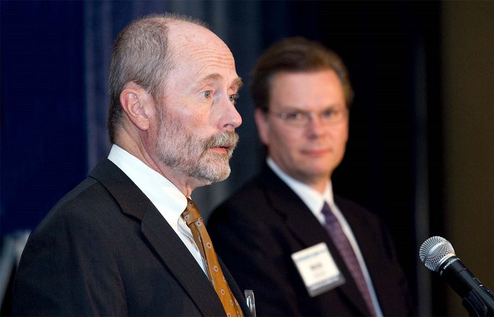 Jamie C. Kowalski introduces incoming Board Members Michael Louviere (Bellwether Class of 2010) and John W. Strong (Bellwether Class of 2011) as Rick Dana Barlow looks on.