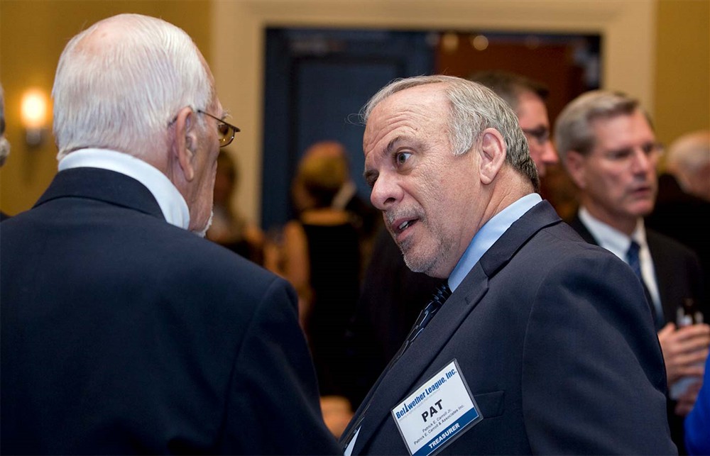 Founding/Platinum Sponsor Premier’s Don Hancock laughs with Bellwether Class of 2008 Inductee Lee Boergadine and Bellwether League Secretary John Gaida with Bellwether Class of 2009 Inductee Sam Raudenbush (far right).