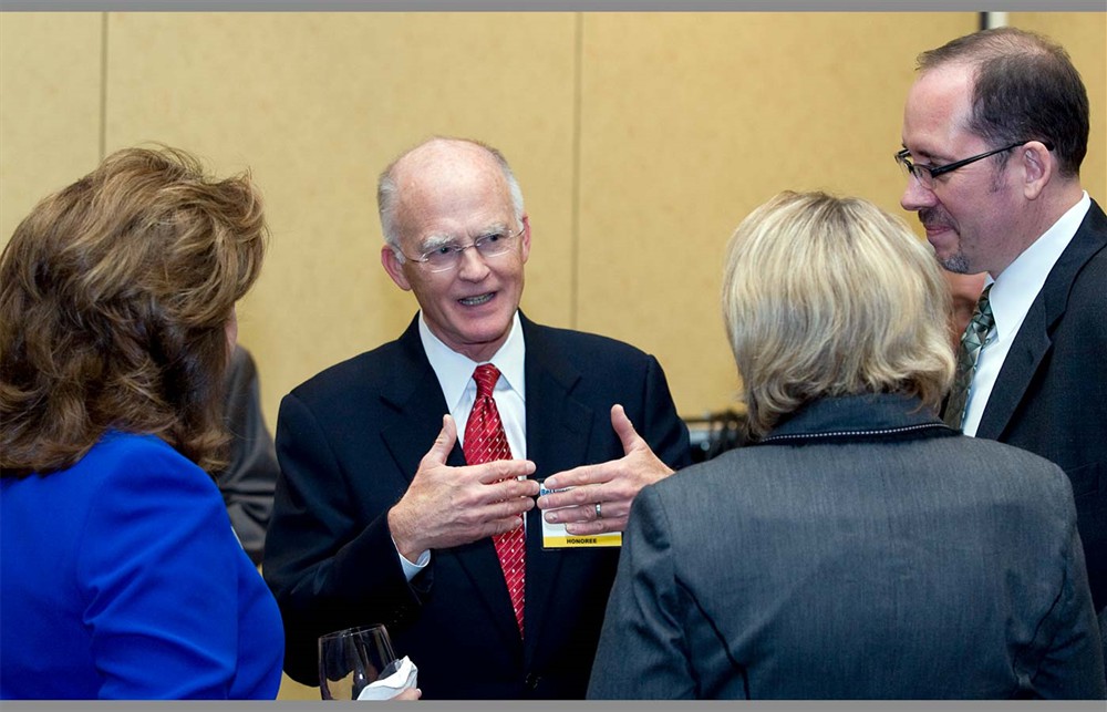 Bellwether Class of 2010 Honoree Curt Selquist (center) shares some insights with Johnson & Johnson Health Care System’s Pam Dickerson (far left) and Meg Walter and with consultant Rod Piechowski.