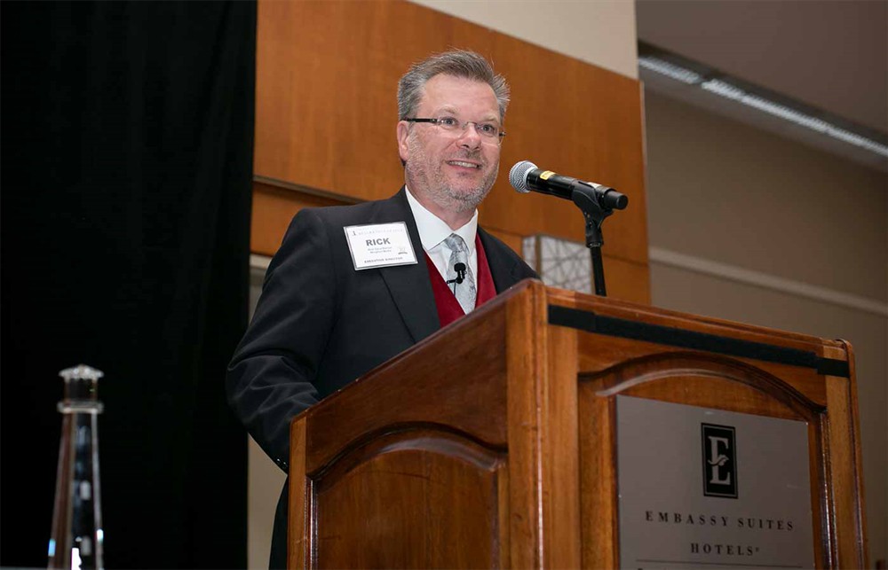 Bellwether League Co-Founder and Executive Director Rick Barlow opens the induction ceremony.