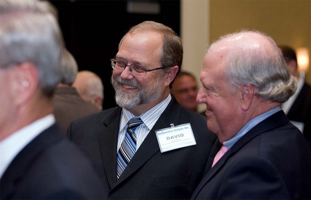 University HealthSystem Consortium’s David Wood and Founding/Platinum Sponsor Premier’s Don Hancock (right) renew friendships during the VIP reception.