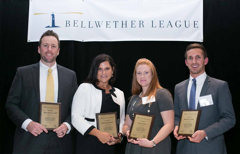 Future Famers Class of 2017 with their awards: Standing (left to right) Mark Growcott, Ph.D., Karen Kresnik, R.N., Elise Nagowski for Christy Crestin and Ben Cahoy. Not pictured: Derek Havens and Christy Crestin.