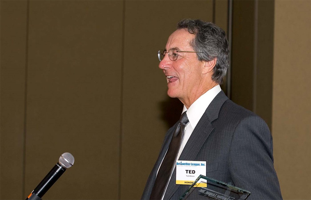 Bellwether Class of 2011 Honoree Daniel J. Dryan (center) enjoys some family time with daughter-in-law Jeannie Dryan (left) and son Peter Dryan (right).