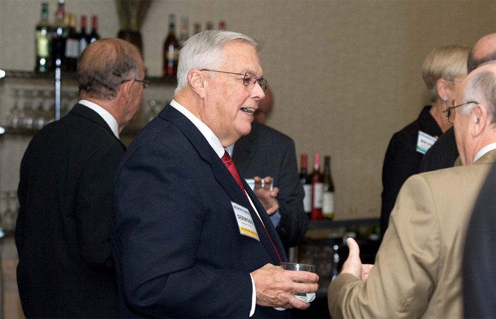 Bellwether Class of 2011’s Derwood Dunbar Jr. (left) chats with Bellwether Class of 2010’s Michael Louviere (right).