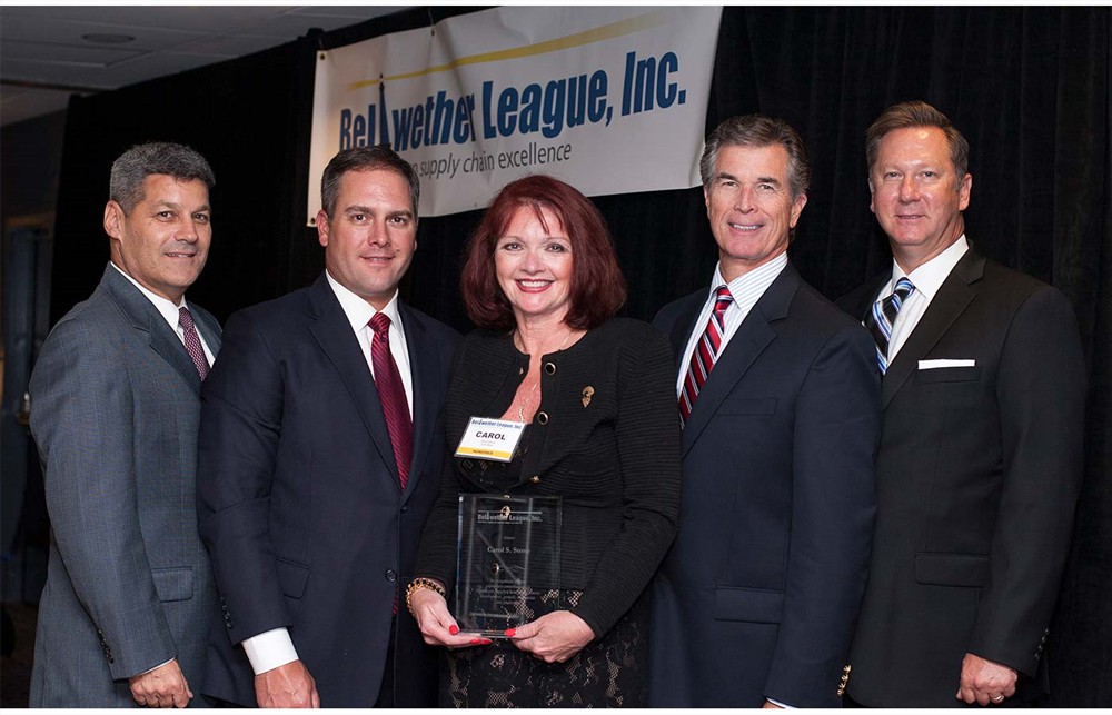 Bellwether Class of 2016 Inductee Carol Stone flanked by C.R. Bard colleagues (left to right) Mike Terlizzi, Adam Dalum, Glenn Murray and Steve Goode