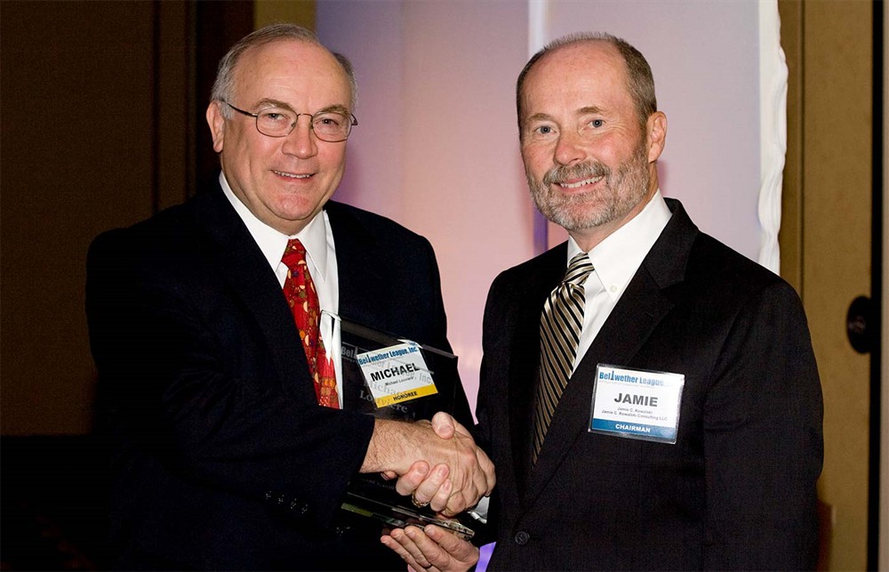 Bellwether Class of 2011 Honoree Laurence A. Dickson (left) with wife Tobey Dickson (center) reflects with Bellwether League Inc. Treasurer Patrick E. Carroll Jr. (right).