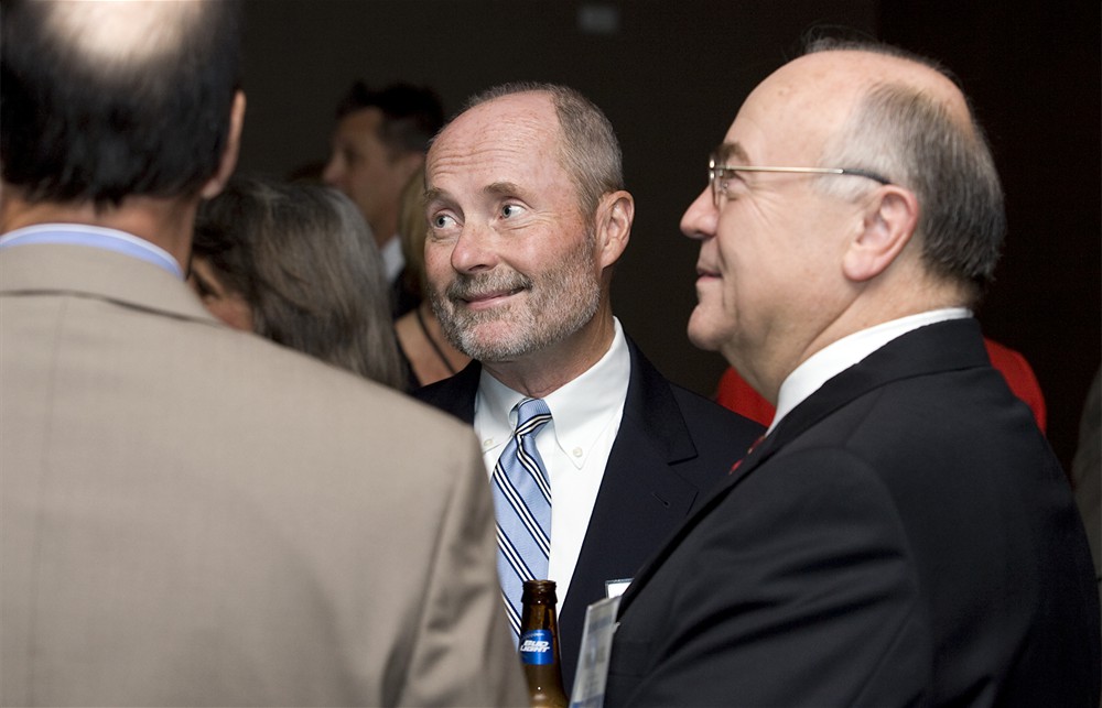 Bellwether League’s Jamie Kowalski (center) and Michael Louviere (right), along with Mike Neely (left, back to camera)