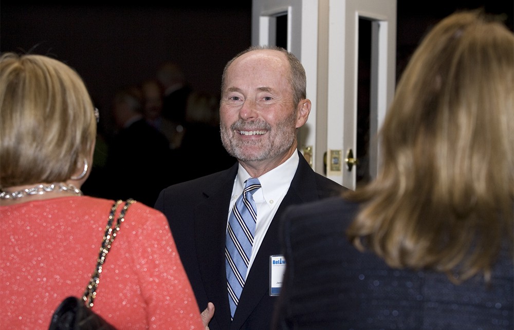 Bellwether League’s Jamie Kowalski enjoys a lighter moment with Roberta Graham, R.N. (Bellwether Class of 2012) (left, back to camera)