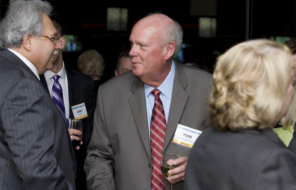 SMI’s Tom Hughes (center) (Bellwether Class of 2012) joshes with Scott & White’s Phil Profeta