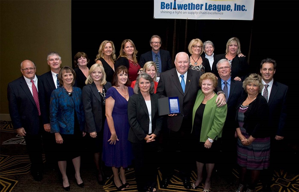 Bob Simpson (Bellwether Class of 2012) and wife Linda Simpson is flanked by his colleagues and supporters from LeeSar and Cooperative Services of Florida