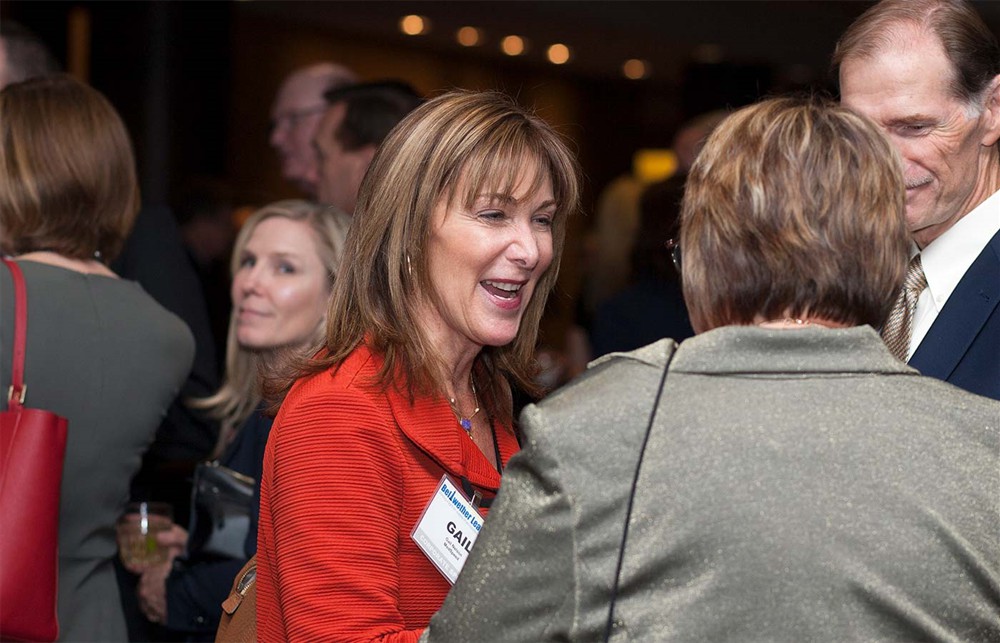 Corporate Sponsor MedSpeed’s Gail Nelson (left) with Corporate Sponsor HealthCare Links’ Ken Murawski (right) and incoming Bellwether League Inc. Board Member Deborah Templeton (center, back to camera).